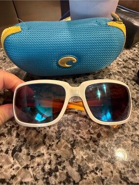 Costa women’sWhite Frame Sunglasses with Mirrored Lenses